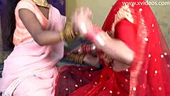 Two Indian wives get naughty with one lucky husband in this desi xxx video