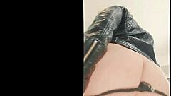 HD video of mistress in fishnet dress and corset with fetish accessory